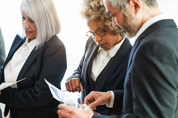 multiracial-colleagues-working-on-a-claim attorneys working